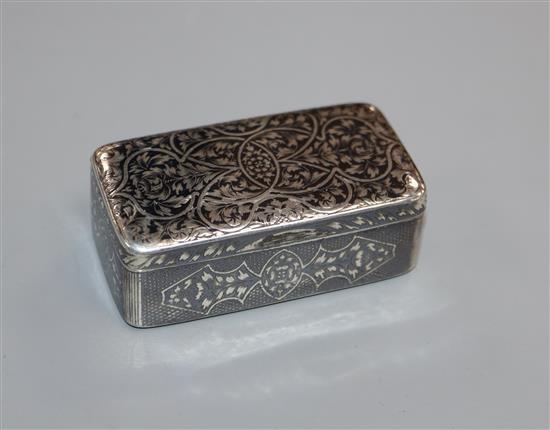 A 19th century Russian 84 zolotnik and niello snuff box, 56mm.